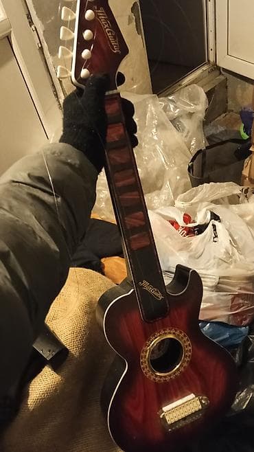 Saz: Akustik gitara, 6 sim — 2