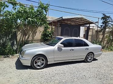 mersedes c class: Mercedes-Benz E-Class: 2.5 l | 1997 il Sedan — 7