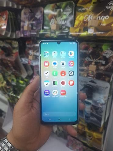Samsung Galaxy A06, 64 GB, rəng - Ağ, Barmaq izi — 1