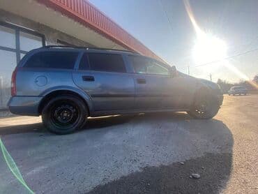 oka satılır: Model: Opel Astra Caravan (universal kuzov) Rəng: tünd boz Yanacaq — 1