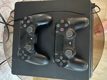 PlayStation 4 1 TB oyun konsolu. Konsol iki ədəd orginal DualShock 4