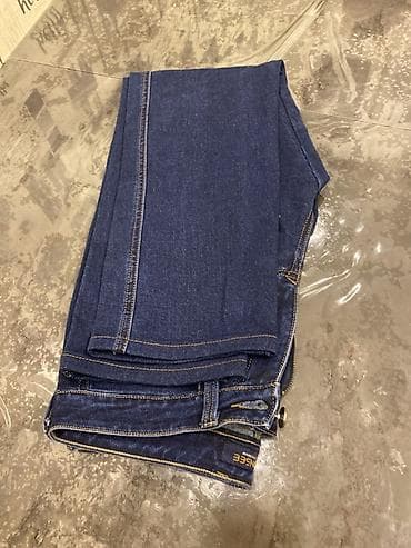 kisi salvari: Tünd-mavi rəngdə klassik cins şalvar baha alinb kişi ucun - Material — 2