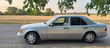 traktor mtz 82: Mercedes-Benz W124: 2.2 l | 1993 il Sedan — 2