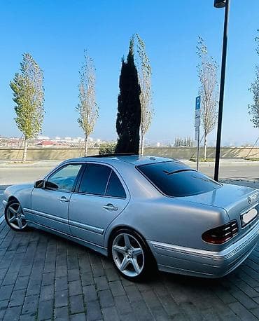 qara disk: Mercedes-Benz E-Class: 3.2 l | 2000 il Sedan — 2