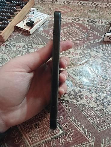 muzukalni centir: IPhone 15, Qara, Face ID — 2