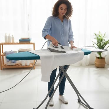 Ütüləmə lövhələri: Ütü masası - Metal səthli, buxarın rahat keçməsi üçün çoxsaylı deşikli — 1