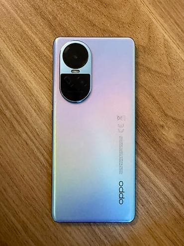 телефон fly б: Oppo Reno10, 256 ГБ, цвет - Синий, Кнопочный, Отпечаток пальца, Face ID — 3
