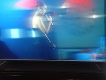 divarda televizor dizayni: LED televizor – böyük ekranlı, nazik çərçivəli model Xüsusiyyətlər: - — 1