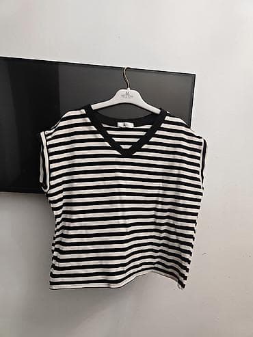 Kişi geyimləri: Qara-ağ zolaqlı qadın köynəyi - Model: qolsuz/yarımqol kəsimi, düşük — 1