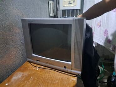 техника видео: Köhnə tip kineskop TV (CRT), gümüşü korpus. Xüsusiyyətlər: - Təxminən — 1