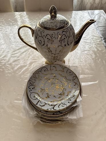 bala pisiklər: Porcelain çay dəsti – zərif qızılı naxışlı Məhsulun tərkibi: - 1 ədəd — 2