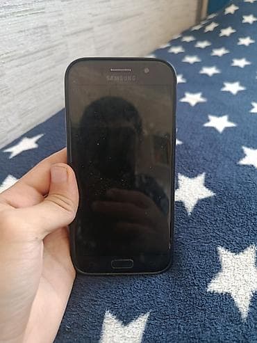 islenmis notebook aliram: Samsung Galaxy A3 2017, 16 GB, rəng - Qara, Barmaq izi — 1