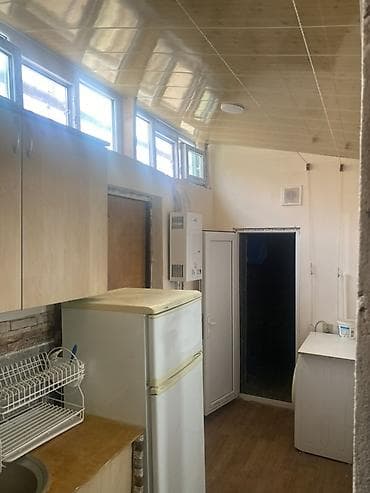 2 otaqlı mənzil – mətbəx, qonaq otağı və yataq otağı ilə