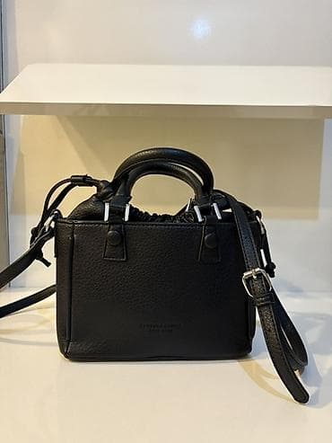 son model cantalar: Məhsul: Qara miniatür qadın çantası Orta olculu, yeni kimidir. Ici — 2