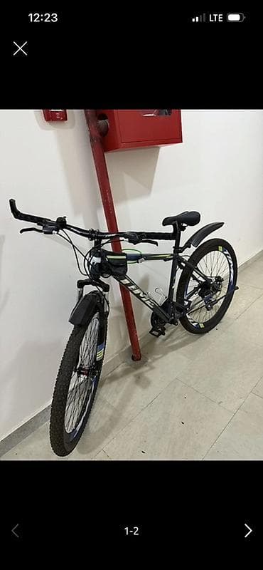 Dağ/şosse tipli velosiped - 29" təkərlər, qalın protektorlu şinlər –