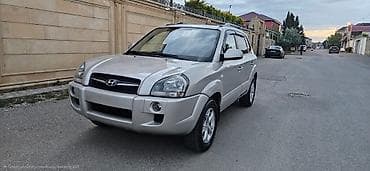 Hyundai Tucson (1-ci nəsil) krossover - Korpus: gümüş rəngli, kompakt