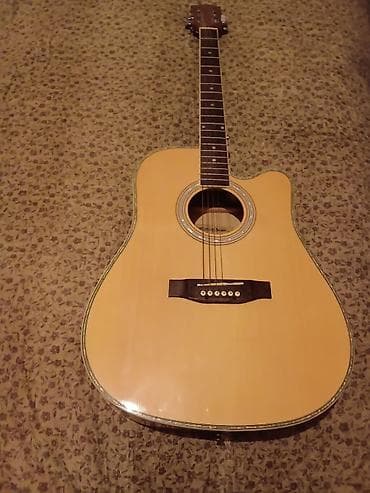 gitara sim: Akuastik gitara – dreadnought korpus, cutaway (kəsik) dizayn — 1