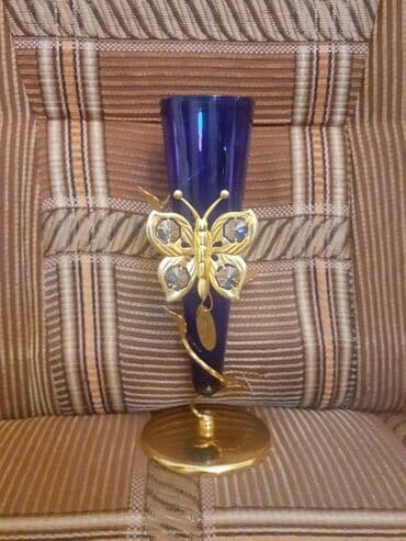 Suvenir. 24 karatlıq qızılla ve kristalla işlenib