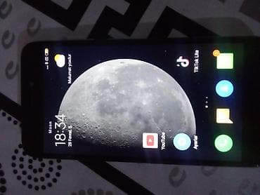 ТВ и видео: Xiaomi Mi 9, цвет - Серебристый, 
 Сенсорный — 1