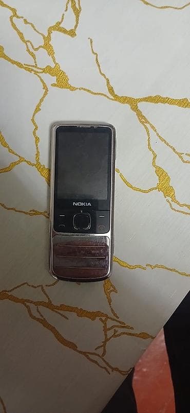 mini telfon: Nokia 6700 Slide, rəng - Boz — 3