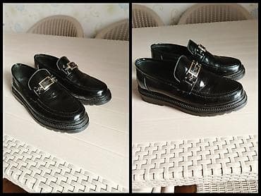 Qara dəri loaferlər - Klassik dizayn: Parlaq qara üst hissə, tikiş