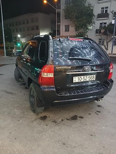 kia k3: Kia Sportage: 2 l | 2006 il Ofrouder/SUV — 9