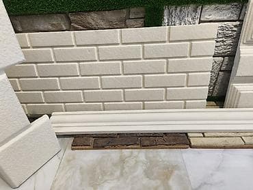 blok kerpic: Dekorativ divar panelləri və plintuslar – ağ rəngli, kərpic fakturalı — 1