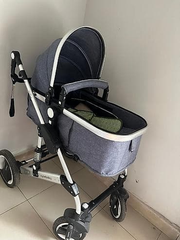 Uşaq geyimi və ayaqqabıları: Çıxarıla bilən beşikli araba — 2