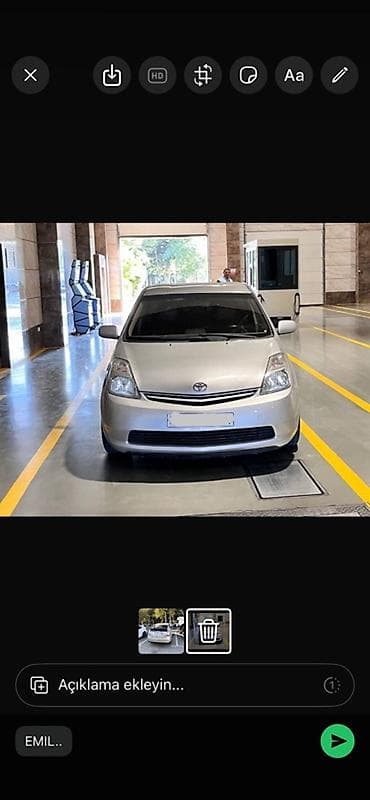 Toyota Prius (2-ci nəsil) hibrid hetçbek - Gümüşü/gri rəngli kuzov -