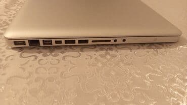 klaviatura: Apple MacBook Pro noutbuku Xüsusiyyətlər: - Alüminium unibody korpus — 6