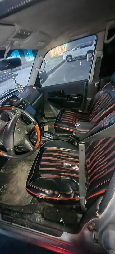 moto debilqe: Mitsubishi Pajero iO (GDI) – kompakt 4x4 krossover/SUV - Gümüşü rəng — 5