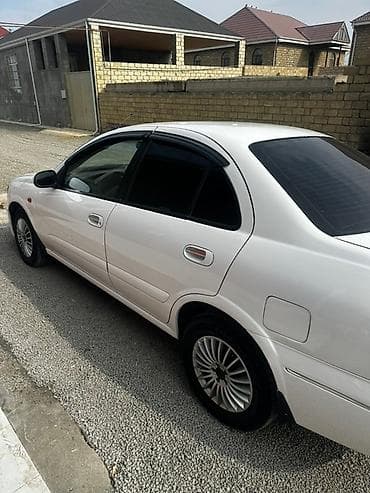 014 sekilleri: Nissan Sunny: 1.3 l | 2008 il Sedan — 3