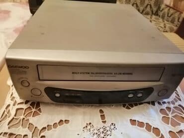 Digər TV və video məhsullar: Daewoo markalı gümüşü rəngli VHS videomaqnitofon. "Multi System 240
