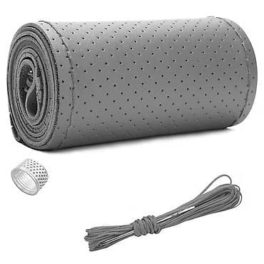 Sükan üzlüyü – dəri teksturalı, perforasiyalı səth. Təzə