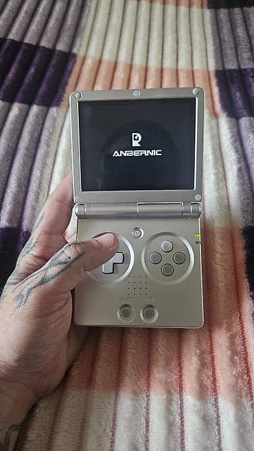 mini gps: Anbernic RG35XXSP — retro oyunlar üçün nəzərdə tutulmuş portativ (əl — 1