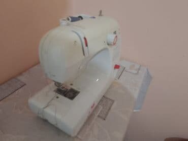 Şəxsi qulluq: Elektron tikiş maşını - Kompakt, stolüstü model; ağ korpus, qırmızı — 3