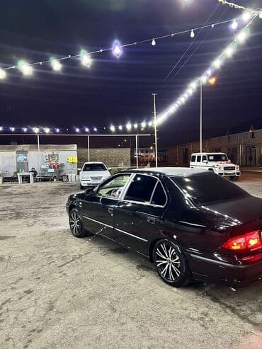 çin maşınları turbo az: Maşın: Qara rəngli sedan Xüsusiyyətlər: - Korpus: 4 qapılı sedan — 4