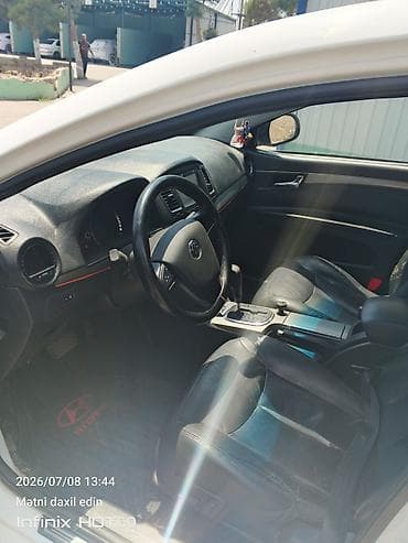 kia forte diffuser: Ağ rəngli sedan – tam ölçülü şəhər və magistral üçün rahat və praktik — 6