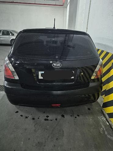 avtomobillər: Kia Rio: 1.5 l | 2007 il Hetçbek — 9