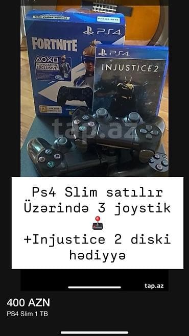 ps4 irşad: Ps4 slim 1 TB satilir. Uzerinde 3 joystick Alana injustice 2 diski — 1