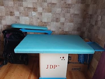 paltar yuyan ustasi: Genaratorlu buxarlı ütü və qadın manikeni — 1