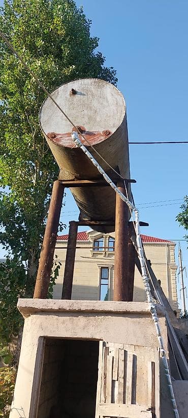 2 ton: Tahirə xanım . Su çəni yaxşı vəziyyətdə qalin dəmirdəndir 3.50 ton 500 — 3
