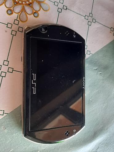 memo cx: Sony PSP Go (PSP-N100x) əl konsolu - Sürüşdürülən dizayn: ekran — 8