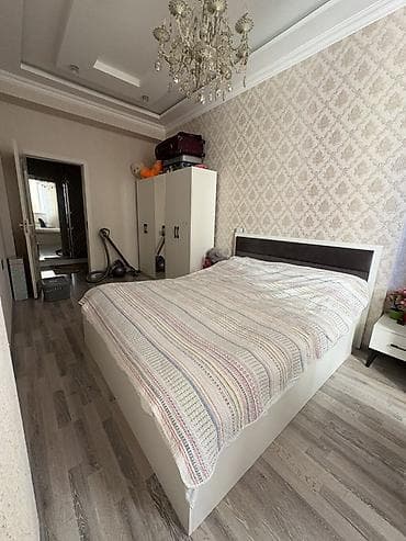 İkinəfərlik çarpayı