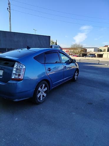 ford ehtiyat hisseleri: Toyota Prius (2-ci nəsil) hibrid hetçbek - Rəng: mavi - Salon: boz — 4
