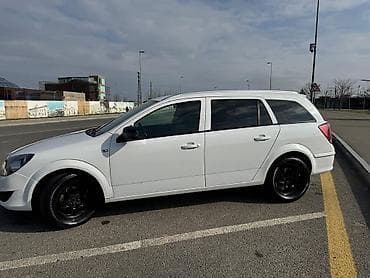 afdomobil: Opel Astra Caravan (Universal) - Kuzzov: universal (Caravan), ağ rəng — 5