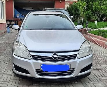 ferrari satilir: Opel Astra: 1.7 l | 2008 il Universal — 2