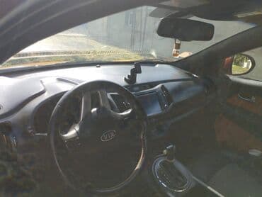 qadın üçün maşınlar: Kia Sportage: 2 l | 2011 il Ofrouder/SUV — 10