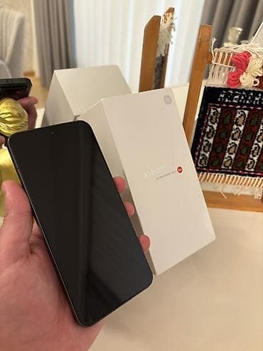 redmi pad 2 kabro: Xiaomi 13, 256 GB, rəng - Qara, 
 Barmaq izi, Simsiz şarj, İki sim kartlı — 2
