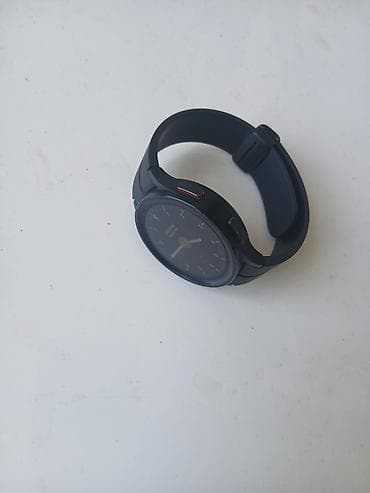 galaxy watch: Samsung Galaxy Watch (qara), maqnitli USB‑C simli şarj cihazı ilə — 3